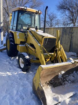 - John Deere 310J 1991 , 2100000 , 